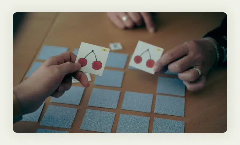 vGrid of face-down cards arranged for memory matching game at trade show 