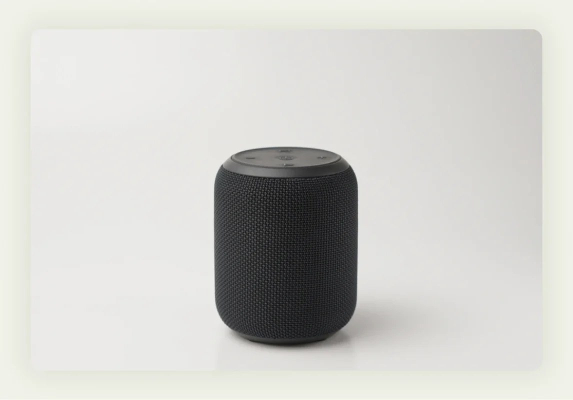 Portable Bluetooth speakers and smart devices with company logos for VIP trade show guests