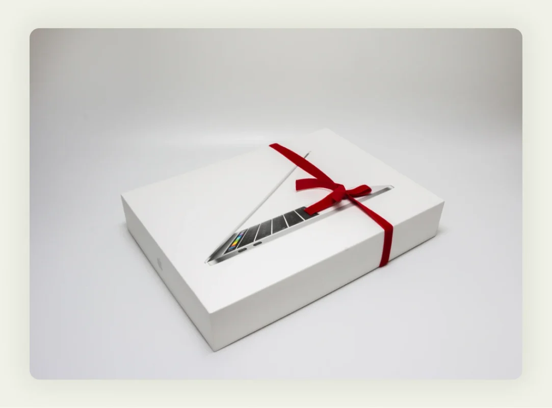 Premium laptops with company branding for exclusive trade show partnership announcements